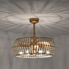 a chandelier hanging from the ceiling in a room