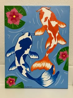 a painting of two koi fish in the water