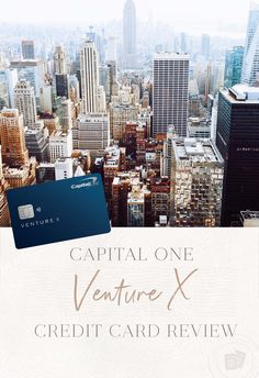 the capital one venture x credit card is shown in front of a cityscape