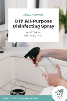 a woman is using a disinfectant spray to clean the dishes in her kitchen