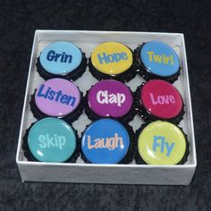 six cupcakes in a box with the words laugh, hope, listen, laugh