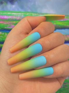 Faded and dreamy! Our Lofi (Meadows) nails boast an ombré cyan blue that melts into a meadow green and peachy pink. This set is inspired by aesthetic scenery in Studio Ghibli films. Alcohol Cleanse, Rasta Nails, Studio Ghibli Films, Nails Baddie, Monster Nails, Aesthetic Scenery, Deep Red Nails, Jade Nails, April Nails