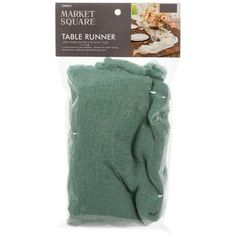 the market square table runner in green is packaged for $ 3 99 per person, and has