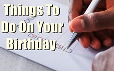 someone writing on a piece of paper with the words things to do on your birthday