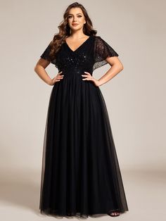 Dazzle at your next event in our Sparkly Sequin A-Line V-Neck Tulle Formal Evening Dress. This stunning dress features a flattering V-neckline and an A-line silhouette adorned with shimmering sequins. The tulle overlay adds a touch of ethereal elegance, making it perfect for formal occasions. Designed to ensure comfort and style, this dress will make you the center of attention. Fit: Please refer to size chart. Length: Floor Length. Sleeve Style: Short sleeves. Closure: It is concealed a zipper up the back. Undergarments: It is not padded, with lining. Fabric:The garment comprises sequin. Stretch: Fabric is no stretch. Evening Gown Plus Size Elegant, Fitted V-neck Tulle Dress, Elegant V-neck Tulle Dress, Tulle V-neck Bridesmaid Dress For Wedding, V-neck Tulle Evening Dress For Prom, Tulle V-neck Dress For Prom, V-neck Tulle Dresses For Prom, V-neck Tulle Prom Dress, Black V-neck Bridesmaid Dress