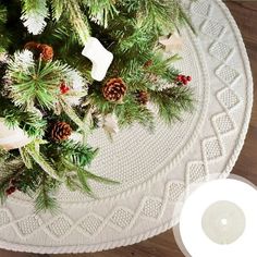 a christmas tree with pine cones and white ornaments on it's branches is shown from above