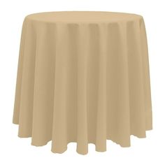 a round table with a beige cloth on it