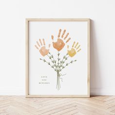 an art print with the words love you bunches and handprints on it