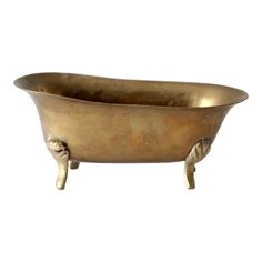 an old metal bathtub with two legs and feet on the side, against a white background