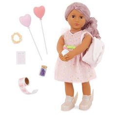 a doll holding a backpack and some items in front of her on a white background