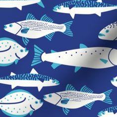 a blue and white fish pattern on fabric