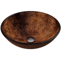 a round wooden sink with a black rim and an oval shaped bowl in the center