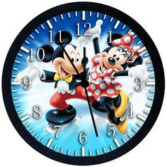 a mickey and minnie mouse clock with blue background