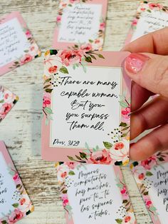 a person holding a card with some flowers on it and the words there are many capable women, but you spurs them all