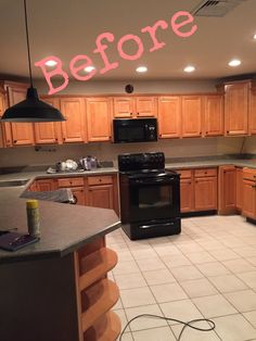 a kitchen with wooden cabinets and tile flooring that has the words before painted on it