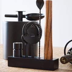 an assortment of kitchen utensils on a table