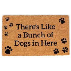 there's like a bunch of dogs in here door mat with paw prints on it