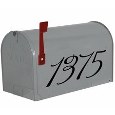 a mailbox with the number 1876 painted on it's front and side panels