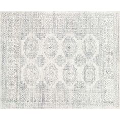 a white rug with an intricate design on it