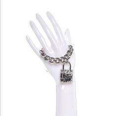 This Is An Authentic Chanel Plexiglass Pearl Cc Padlock Bracelet In Silver. This Is A Large Linked Silver Bracelet That Has A Clear Resin Padlock Shaped Pendant. Inside The Pendant Are Silver And Black Pearl Inclusions With A Facing Silver Chanel Cc Logo. This Is A Bracelet Is Sure To Start A Conversation With The Timeless Style Of Chanel! Size & Dimensions: Circumference:6.00 In / Case: 38:00 Mm/ Band: 19.00 Mm Clear Resin, Black Pearl, Silver Bracelets, Womens Jewelry Bracelets, Timeless Fashion, Silver Bracelet, Chanel, Women Jewelry, Band