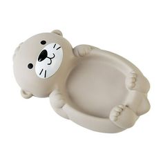 an animal shaped soap dish on a white background