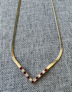 Vintage Avon Gold Tone V Necklace Garnets Rhinestones 16" | eBay Vintage Avon Jewelry, V Necklace, Avon Jewelry, Vintage Avon, Childhood Memories, Antique Jewelry, Garnet, Size 16, Choker Necklace