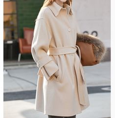 Product Description: handmade Cashmere coat high grade fabric,cashmere fabric.also could be custom made with any size and other colors,please feel free to contact with me if you want custom it. Material: cashmere 100% Size: S: Bust : 102 cm shoulder and Sleeve:70cm Length:105cm M: Bust : 106 cm shoulder and Sleeve:71cm Length:105cm L: Bust : 112cm shoulder and Sleeve:72cm Length:105cm XL: Bust : 116cm shoulder and Sleeve:73cm Length:105cm Shipping we ship worldwide the USPS takes about 15 days a Beige Wool Coat With Stand Collar For Winter, Winter Wool Coat With Stand Collar, Single Breasted, Formal Cashmere Wool Coat For Winter, Solid Cashmere Long Coat, Beige Long Sleeve Wool Coat For Winter, Solid Color Long Cashmere Coat, Elegant Long Sleeve Sweater Coat For Business, Cream Wool Coat For Business In Winter, Elegant Wool Outerwear With Long Sleeves