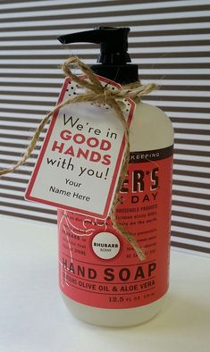 a bottle of hand soap with a label on it that says, we're in good hands with you