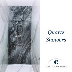 a marble shower with the caption quartz showers