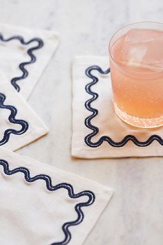 With their playfully scalloped border, the Madeline napkins add a special touch to any casual gathering or evening soirée. | Madeline Cocktail Napkins, Set of 4 by Anthropologie in Blue, Size: Small, Cotton Scalloped Border, Cocktail Napkin, Champagne Flutes, Flutes, Cocktail Napkins, Napkins Set, Napkins, Champagne, Anthropologie