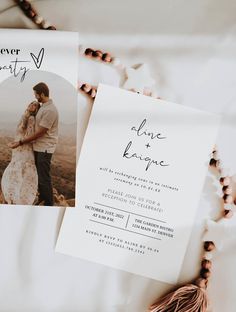 an image of a couple on their wedding day with the save the date card in front