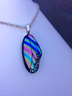 Butterfly Wing Pendant: in pinks and blues by jamiewhite88 on Etsy https://www.etsy.com/listing/242016795/butterfly-wing-pendant-in-pinks-and Pink