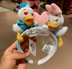 Authentic Disneyland Disney couple donald daisy duck with heart ear Headband New  | eBay Daisy Duck Hat, Disney Couple, Donald And Daisy Duck, Couple Things, Disney Couples, Daisy Duck, Disney Ears, Bad Weather, Ear Headbands