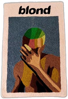 a towel with the words blond on it and a woman's face painted in multicolors