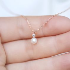 Tiny Diamond & Pearl necklace✨ fresh water pearl and natural diamond setting pendant necklace. 14K solid gold jewelry. * Detail * Material : 14k solid gold with fresh water pearl and genuine diamond. color : rose gold, gold or white gold * Size * Necklace length : 16.5 inches (If you want change chain length, please leave order note.) Pendant : 5*10 mm Diamond: Genuine 2mm brilliant cut diamond / VS Clarity / H color. Pearl : 4.5~5mm fresh water pearl.  *We provide special package with some Pearl Jewlery, Fresh Water Pearl Necklace, Simple Pearl Necklace, Pearl Necklace Designs, Necklace Diamond, Gold Pearl Necklace, Necklace Pearl