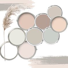 six different shades of paint with a feather in the middle and one is pink, gray,