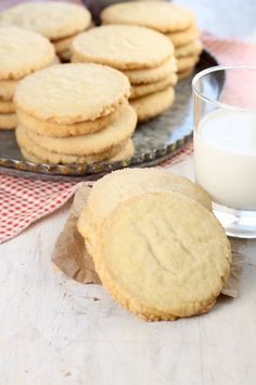 some cookies and a glass of milk on a table