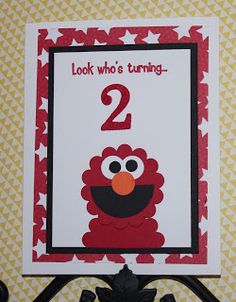 a birthday card with the number two in front of an image of a sesame character