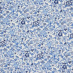 a blue and white floral pattern on fabric