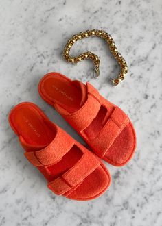 Color: Orange Terrycloth sandal Open toe Slip-on style Double straps Molded footbed Upper: 93% Cotton 7% Polyurethane Lining: 93% Cotton 7% Polyurethane Rubber Sole 1" Platform By Ilio Smeraldo x TFS. Made in Italy Flat Footbed Sandals With Heel Loop For Beach, Beach Footbed Sandals With Heel And Toe Strap, Orange Flat Sandals With Buckle Closure, Orange Open Toe Sandals With Textured Footbed, Orange Buckle Closure Sandals For Beach, Orange Sandals With Buckle Closure For Beach, Orange Sandals With Buckle Closure For Vacation, Orange Buckle Closure Sandals For Vacation, Beach Footbed Sandals With Double Strap And Heel Strap