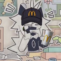 a mcdonald's hat on top of a coffee cup in front of a mural