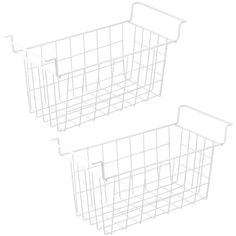 two white wire baskets sitting next to each other