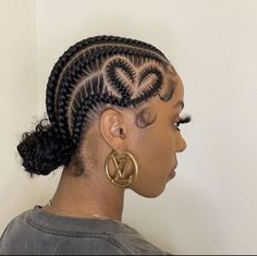 Cornrows Heart Design, Corn Rows With Design, Two Strand Cornrows, Creative Cornrows Design, Cute Cornrow Ideas, Braids With Designs For Black Women, Cornrows Braids For Black Women Bun, Cornrow Bun Hairstyles Black Women, Cornrows With Heart Design