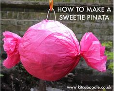 a pink pinata hanging from a tree with the words how to make a sweetie pinata on it