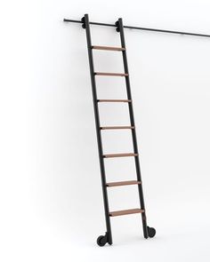 a ladder leaning up against a white wall