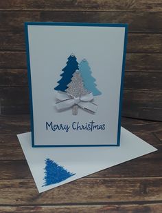 a card with a christmas tree on it