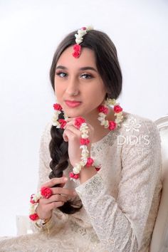 Our floral jewelry is hand made with high quality silk flowers. These are great for your special day as they will remain extravagant through the day.  If you have having a destination wedding then, these are fantastic.  The silk floral jewelry give your wedding a unique look and look fantastic in pictures. DETAILS OF THE FLORAL JEWELRY: Color: Hot Pink & White Size: see model in photo for size Jewelry includes: Tikka, Hoop Earrings, Handpieces We make one of kind pieces.  Once it's gone it's gon Traditional Flower Earrings For Wedding, Traditional White Flower Earrings For Wedding, Traditional White Flower Wedding Earrings, Festive White Flower Earrings, Red Flower Earrings For Wedding, Traditional Pink Flower Earrings, Flower Shaped Bridal Earrings With Flower Decoration, Flower Tikka, Jewelry For Haldi