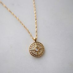 "Finding your path is a personal journey, a dance between self-discovery and the whispers of your heart, leading you to the destination only meant for you." Find your way in style with our Compass Necklace. This playful pendant necklace features a sparkling cubic zirconia center. The perfect accessory for any adventure, it adds a touch of whimsy to any outfit.    -16" in length with 2" extender -stainless steel, gold plated Finding Your Path, The Whispers, Compass Necklace, Find Your Way, Personal Journey, Casual Style Outfits, Style Outfits, Self Discovery, Necklace Pendant