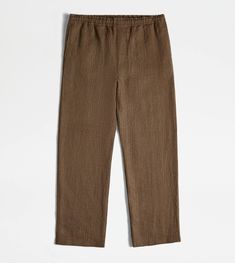 Pants in linen characterized by an elastic drawstring waistband. A fresh style, with an easy and relaxed mood, enriched by the leather Tod's tag on the back pocket. Easy E, Brown Trousers, Gift Boutique, Drawstring Waistband, Linen Pants, Custom Made, Ready To Wear, Buy Online, Online Store