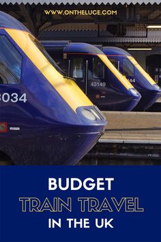 three blue and yellow trains on tracks with the words budget train travel in the uk